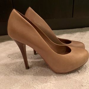 Nude pumps.